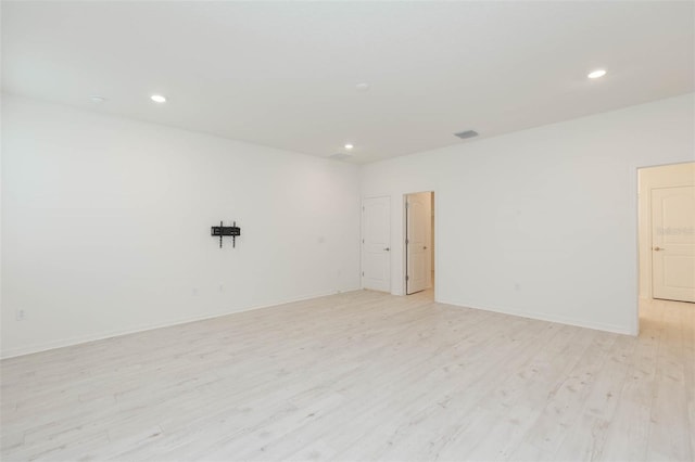 empty room featuring light hardwood / wood-style floors