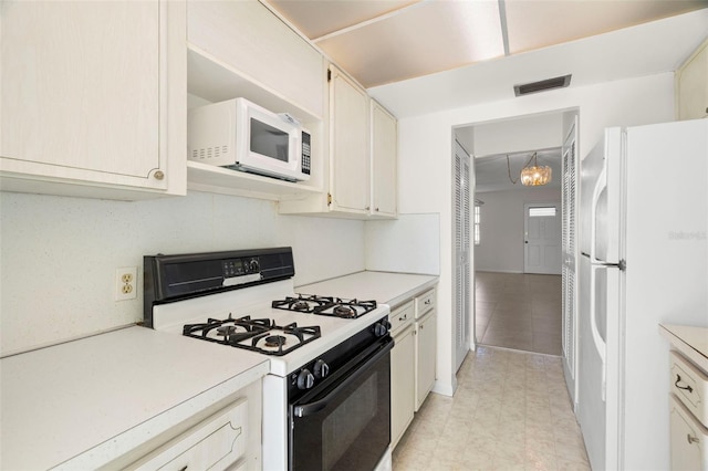 kitchen featuring white appliances