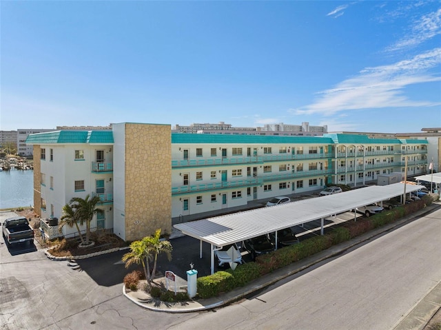 view of building exterior featuring a water view