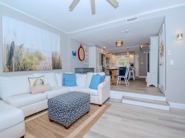 living room with light hardwood / wood-style flooring