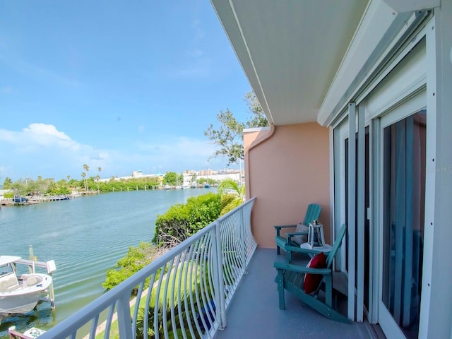 balcony featuring a water view