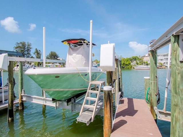 dock area with a water view