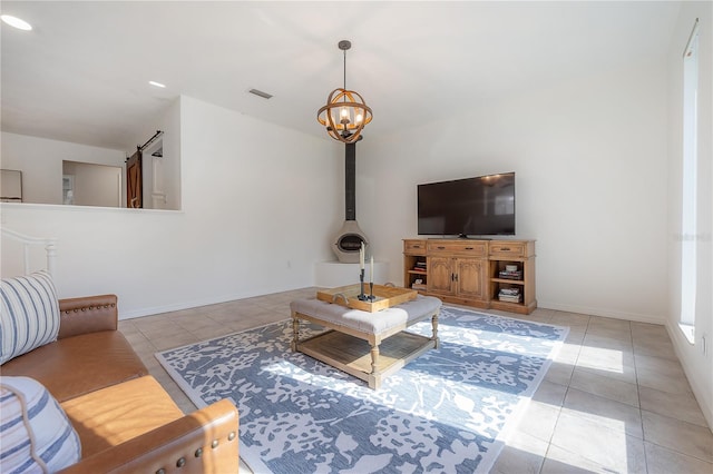 tiled living room featuring an inviting chandelier