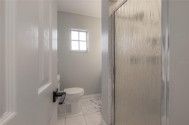 bathroom featuring an enclosed shower and toilet