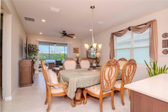 dining room featuring light tile patterned floors, visible vents, and recessed lighting