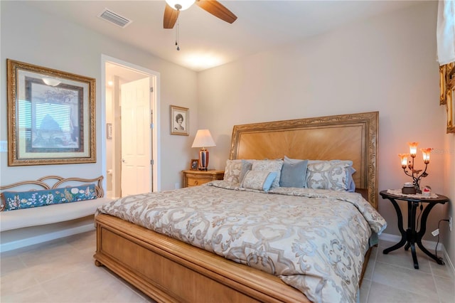 bedroom featuring light tile patterned floors, baseboards, visible vents, and a ceiling fan