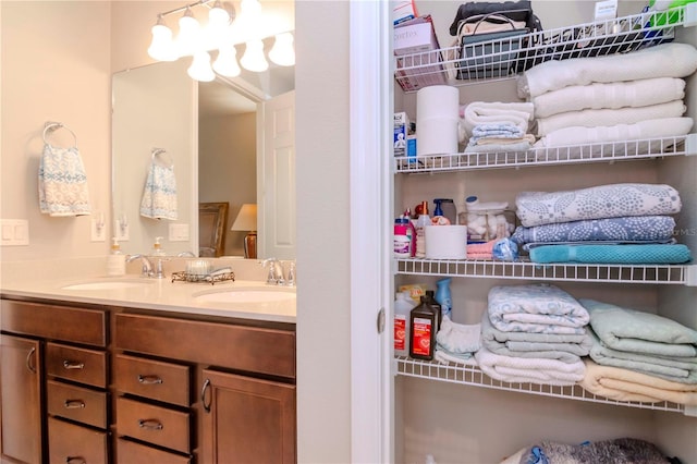 bathroom with double vanity and a sink