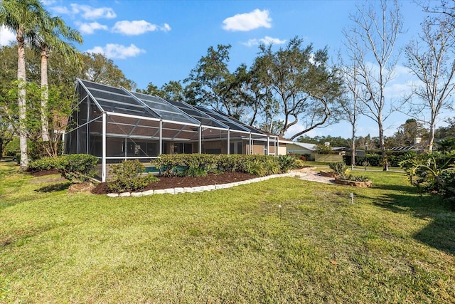 view of yard featuring a lanai