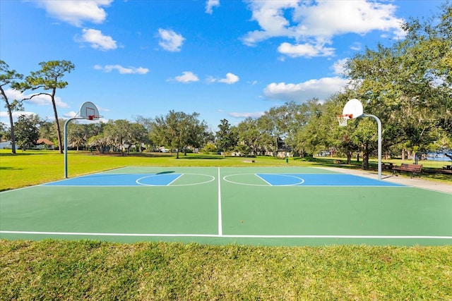 view of sport court with community basketball court and a yard