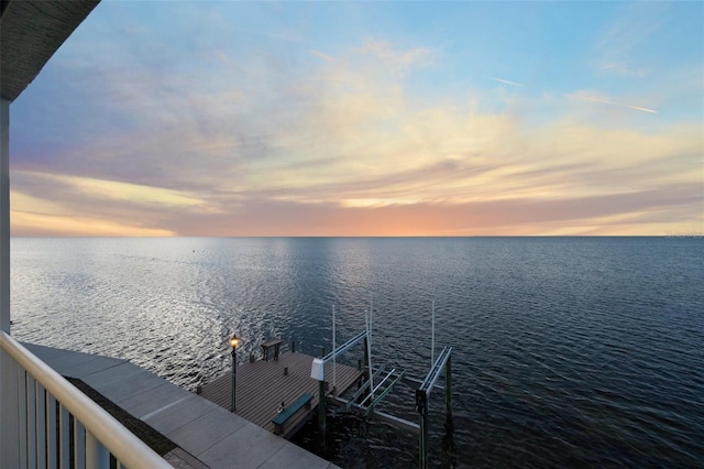 dock area with a water view