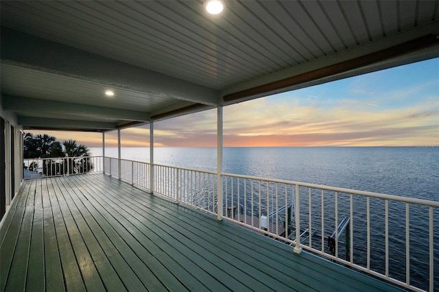 deck at dusk with a water view