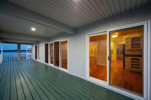 deck featuring a water view