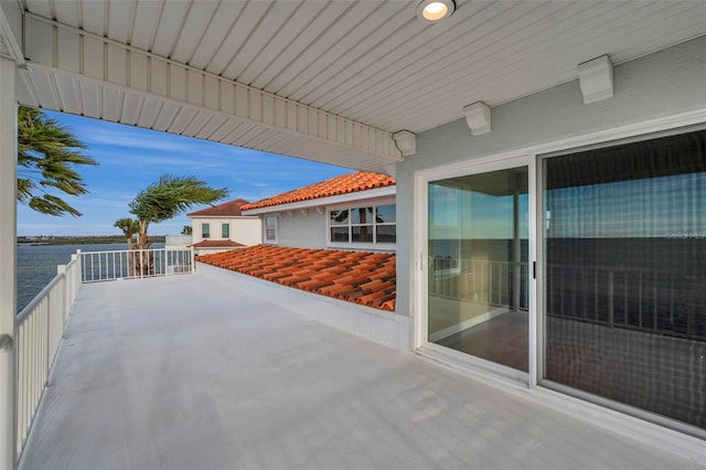 view of patio with a water view