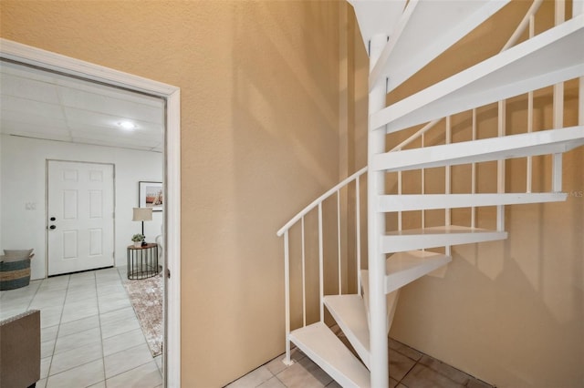 6423 Driftwood Dr, Hudson, FL 34667 - staircase with tile patterned flooring