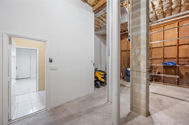 6423 Driftwood Dr, Hudson, FL 34667 - hallway with unfinished concrete flooring
