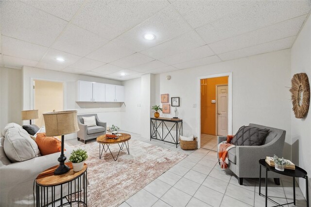 6423 Driftwood Dr, Hudson, FL 34667 - living room with a paneled ceiling, light tile patterned flooring, and recessed lighting