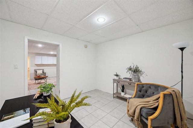 6423 Driftwood Dr, Hudson, FL 34667 - sitting room featuring light tile patterned flooring, a drop ceiling, and recessed lighting