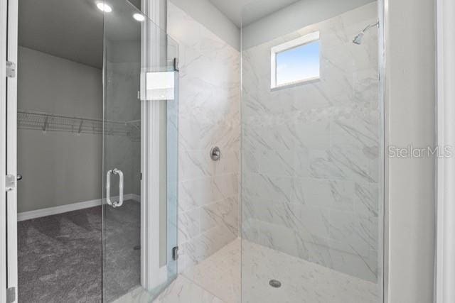 bathroom featuring walk in shower