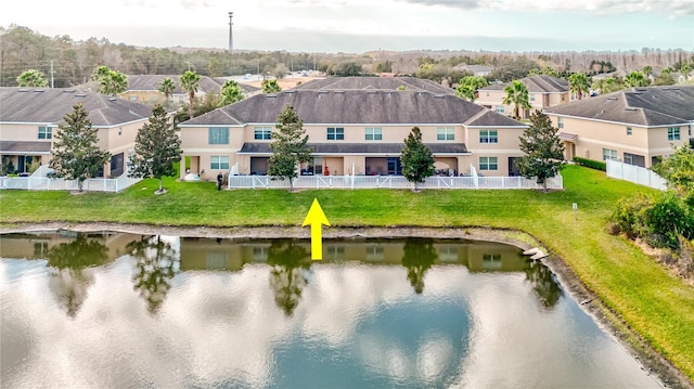 drone / aerial view featuring a water view