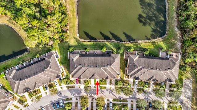 drone / aerial view with a water view