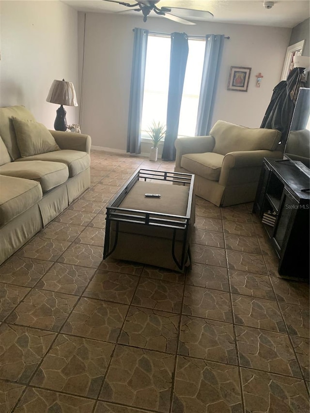 living room with ceiling fan