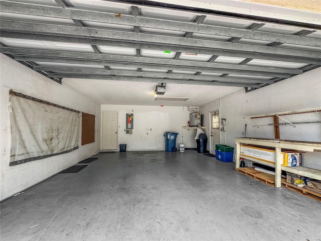 garage with electric panel and a garage door opener