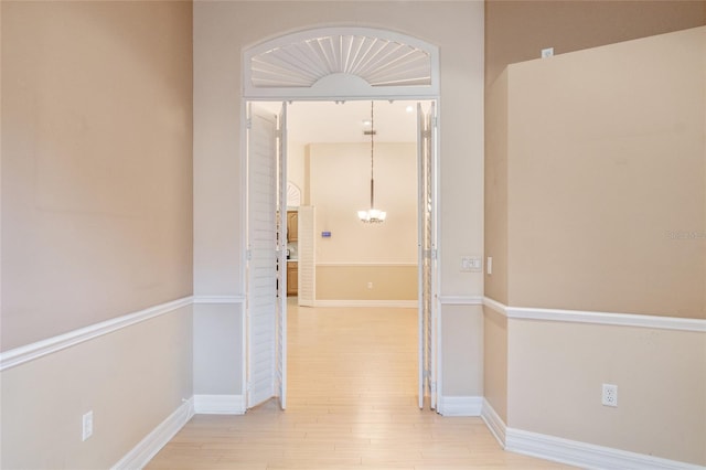 hallway featuring light wood-type flooring