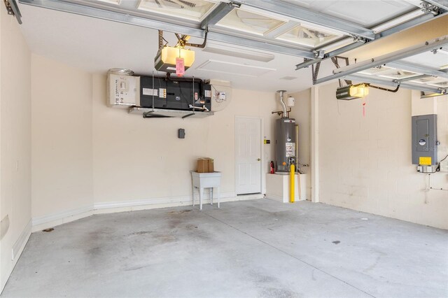 garage with water heater and a garage door opener