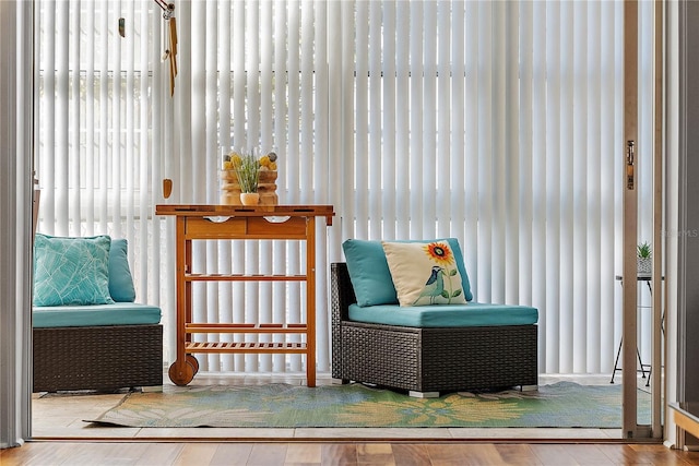 sitting room featuring wood-type flooring