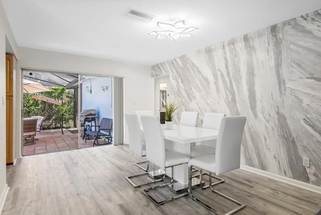 unfurnished dining area with hardwood / wood-style flooring