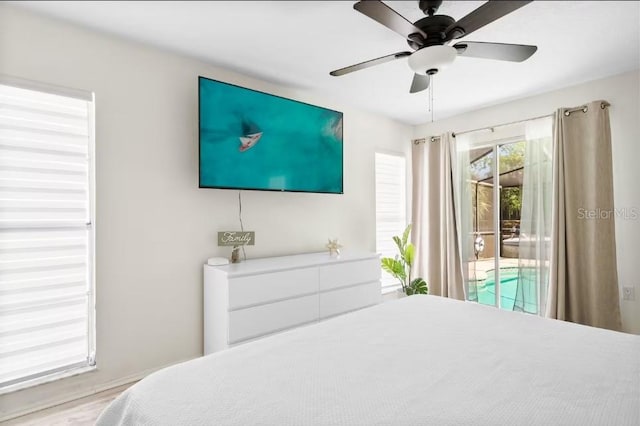 bedroom featuring access to outside and ceiling fan