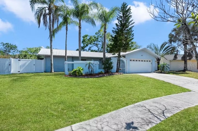 single story home featuring a front lawn and a garage