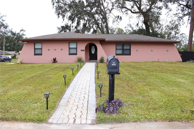 view of front of house with a front yard