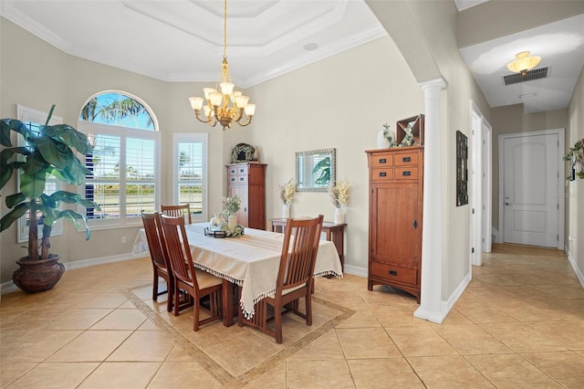 dining room with crown molding, decorative columns, an inviting chandelier, and light tile patterned floors