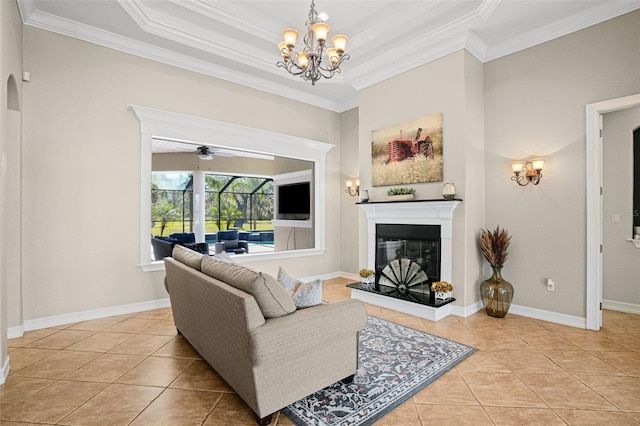 living room featuring crown molding, light tile patterned floors, and ceiling fan with notable chandelier