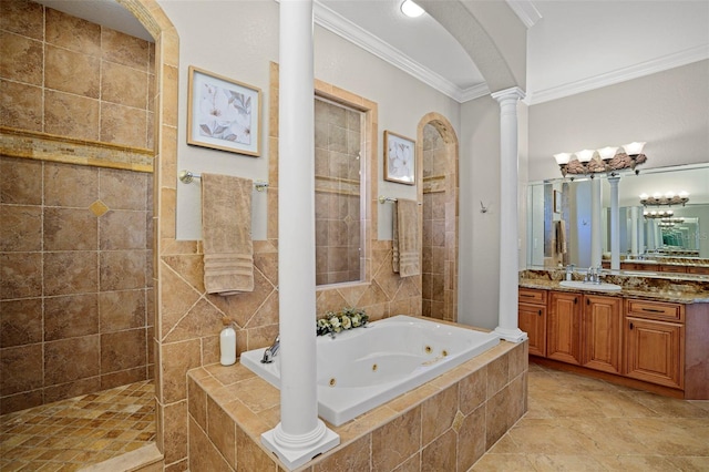 bathroom with ornamental molding, plus walk in shower, vanity, and ornate columns