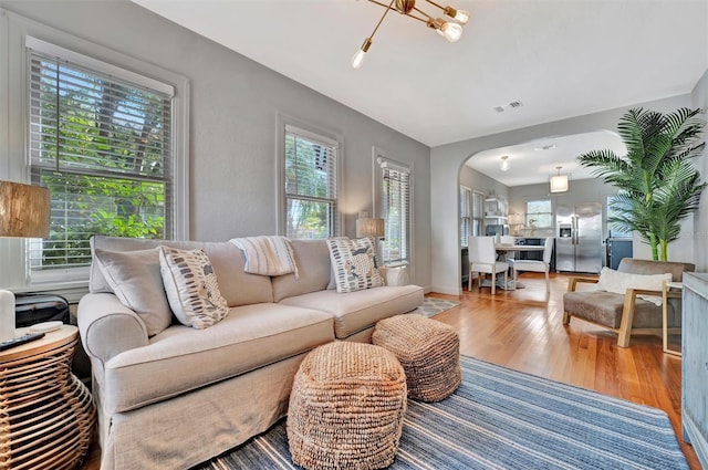 living room with light hardwood / wood-style flooring