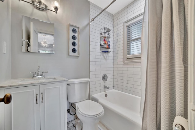 full bathroom with vanity, toilet, and shower / bath combo with shower curtain