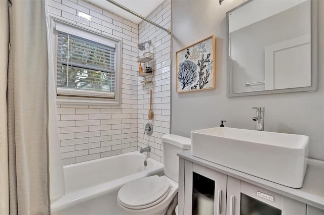 full bathroom featuring vanity, toilet, and shower / tub combo with curtain