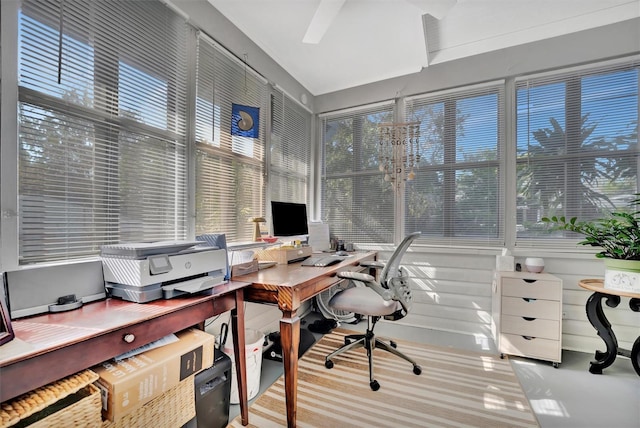 home office with a wealth of natural light and carpet