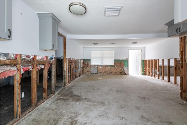 interior space featuring concrete flooring