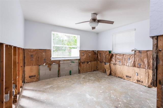 unfurnished room with ceiling fan