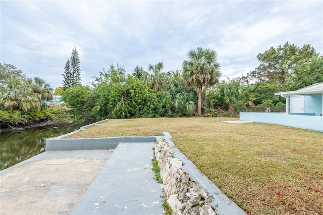 view of yard with a water view