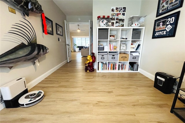 corridor featuring light hardwood / wood-style flooring