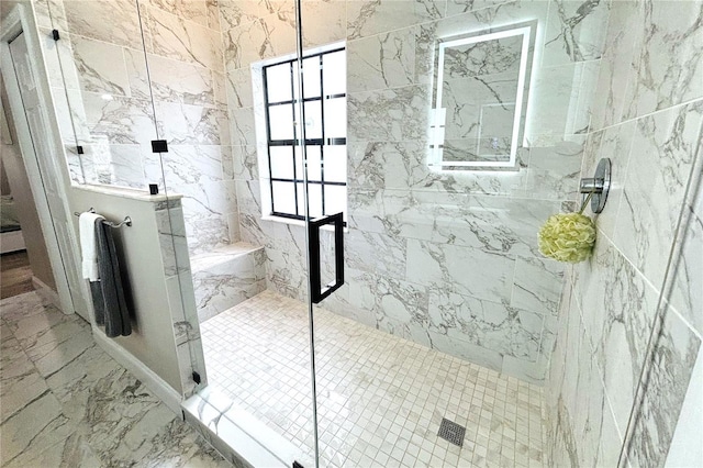 bathroom featuring walk in shower