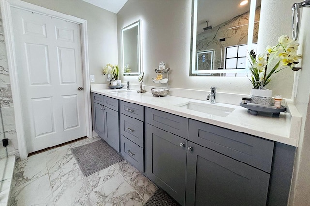 bathroom featuring an enclosed shower and vanity