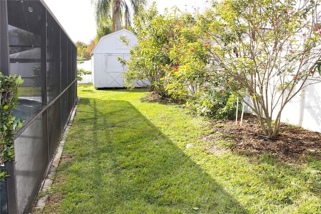 view of yard featuring a storage shed