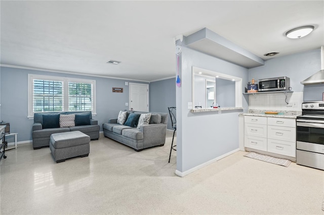 kitchen with appliances with stainless steel finishes, crown molding, decorative backsplash, and white cabinetry