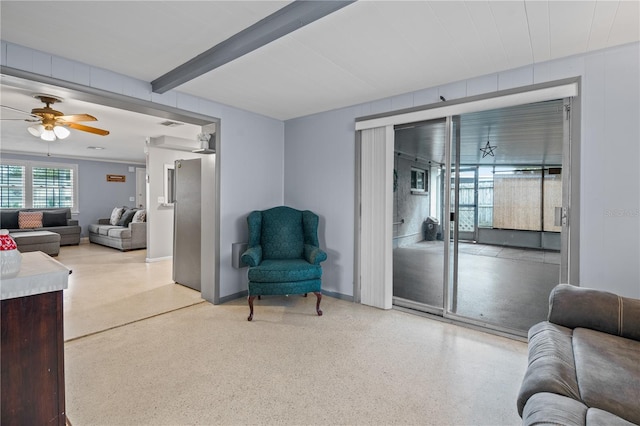 living room featuring ceiling fan