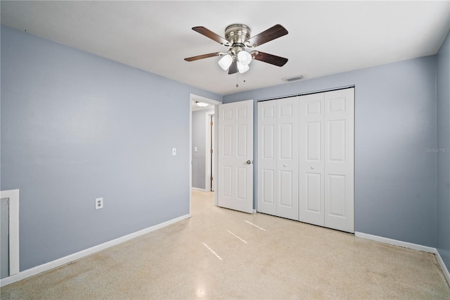 unfurnished bedroom featuring a closet and ceiling fan